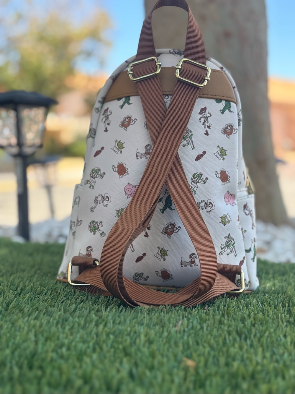 Loungefly Cream Toy Story Character Mini Backpack with Brown Trim - Picture 2 of 2